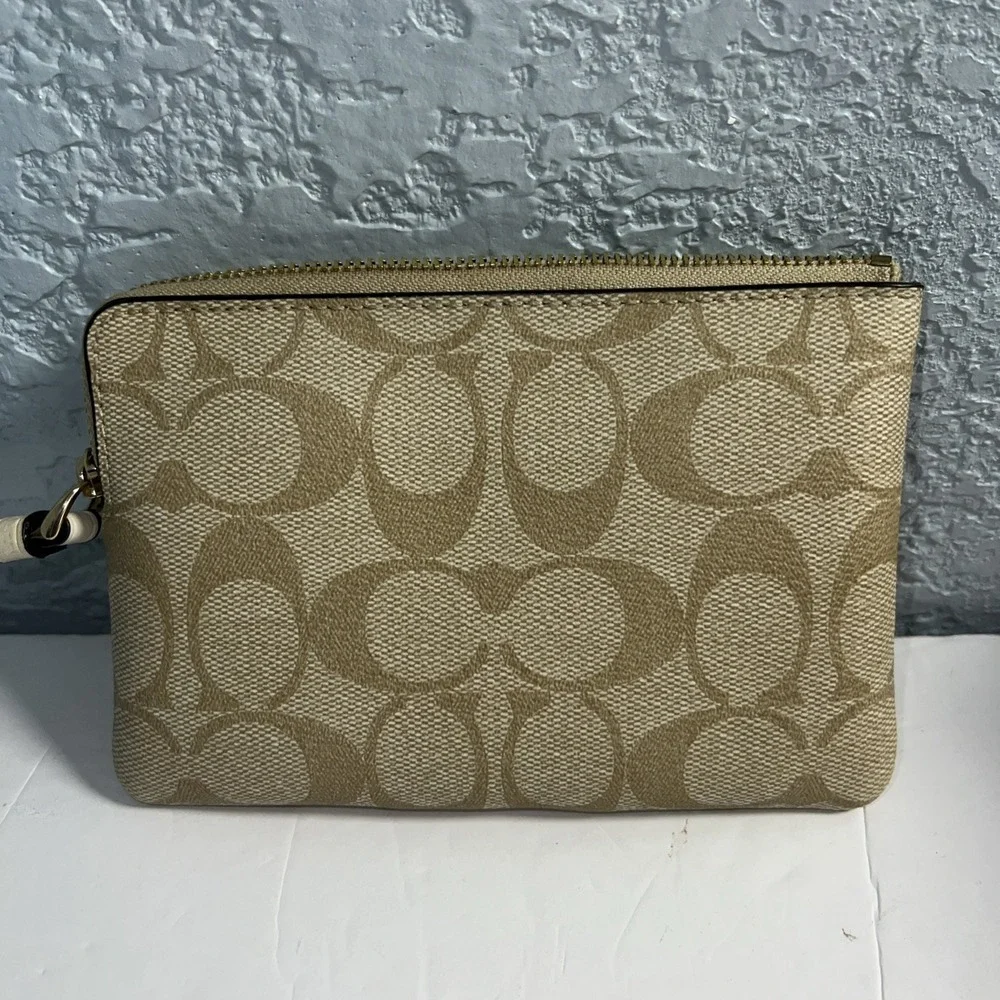 COACH Corner Zip Wristlet in Signature Canvas Stripe Gold Tone Logo Cream/Sand